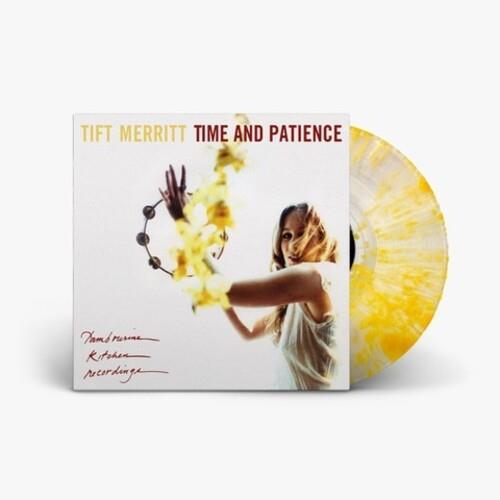 Clear vinyl LP with yellow splatter pattern and album cover featuring a woman holding flowers