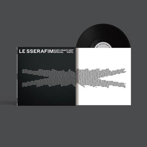 Black and white split vinyl record sleeve with a black disc partially visible