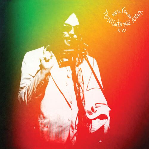 Vinyl record cover featuring a high-contrast illustration of a singer at a microphone against a gree