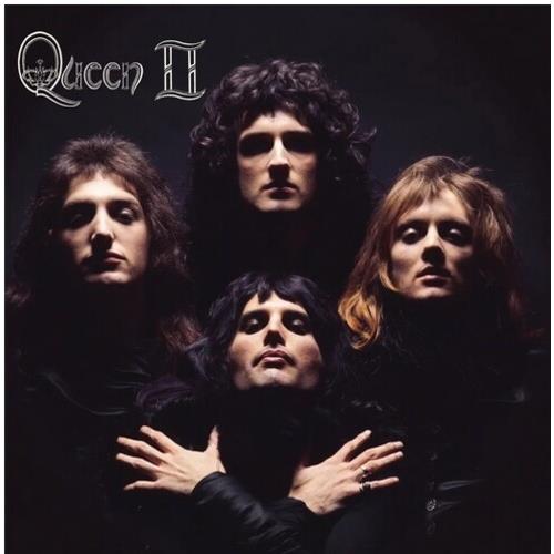 Album cover featuring four band members in dark clothing against a black background