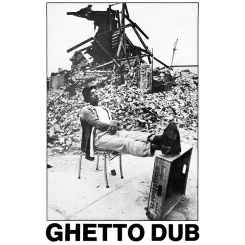 Black and white album cover showing a man seated in front of a rubble pile