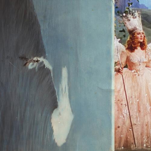 Blue vinyl LP sleeve featuring a split illustration of a crashing wave and a crowned figure in a gow