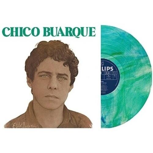 Green and blue marbled vinyl record with illustrated album cover featuring a portrait