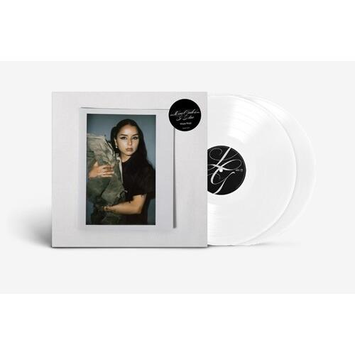 White vinyl LP in a white sleeve featuring a portrait of a woman holding a cat