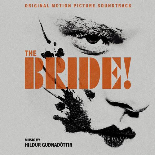 Vinyl LP cover featuring a high-contrast black and white face with bold orange title text