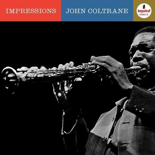 Black and white photo of a saxophonist playing a tenor saxophone