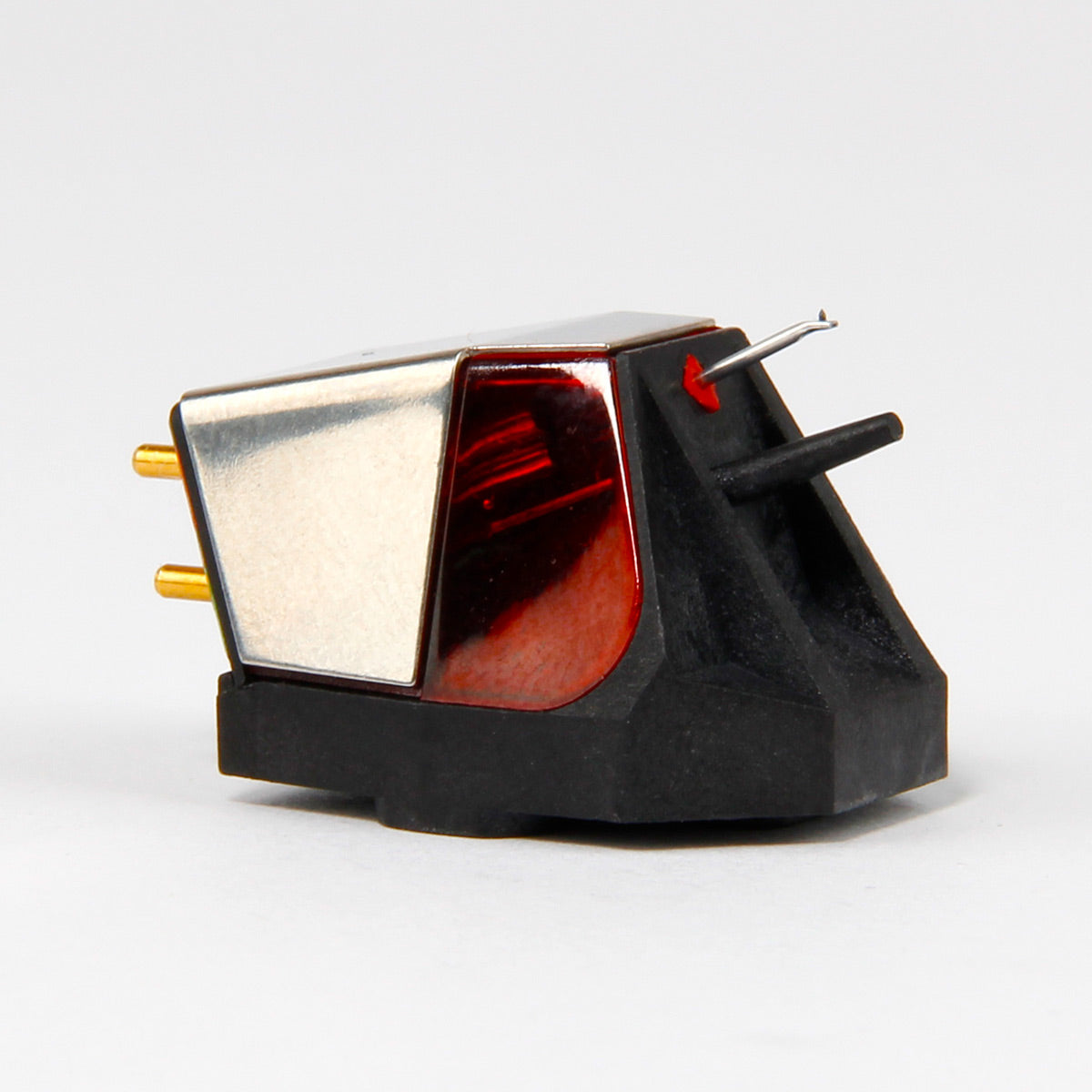 Black and silver phono cartridge with a red stylus guard and gold-plated connection pins
