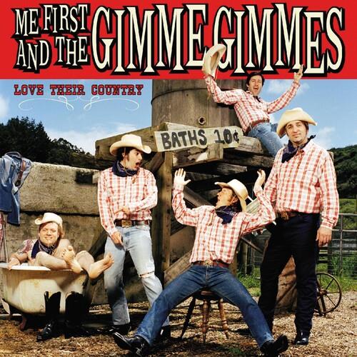 Five band members in plaid shirts and cowboy hats posing around a wooden water tank
