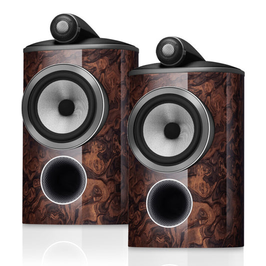 Pair of bookshelf speakers with glossy wood veneer cabinets and top-mounted tweeters