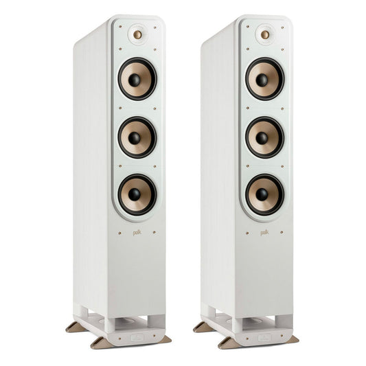 Pair of white floorstanding speakers with three bronze drivers and a tweeter on each cabinet