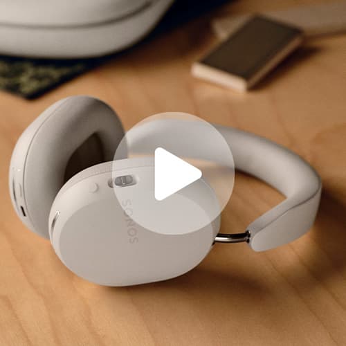 Silver Sony over-ear headphones with padded ear cups and adjustable headband