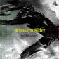 Black and white album cover featuring a silhouetted figure with dandelion seeds