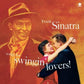 Vinyl LP cover featuring a painted portrait of a man in a fedora and a couple dancing