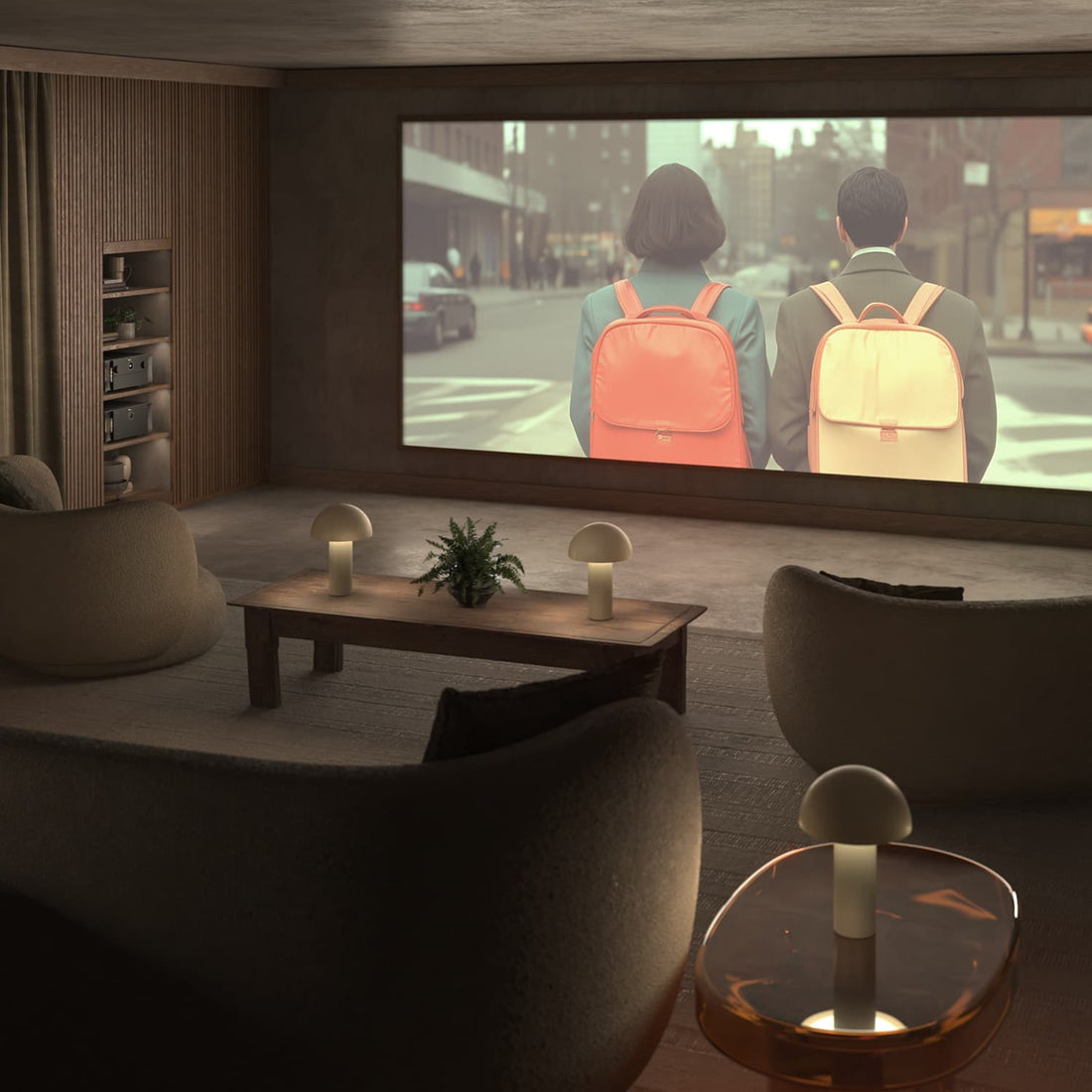 Home theater setup with a large screen, speakers, and a couch in a dark room.