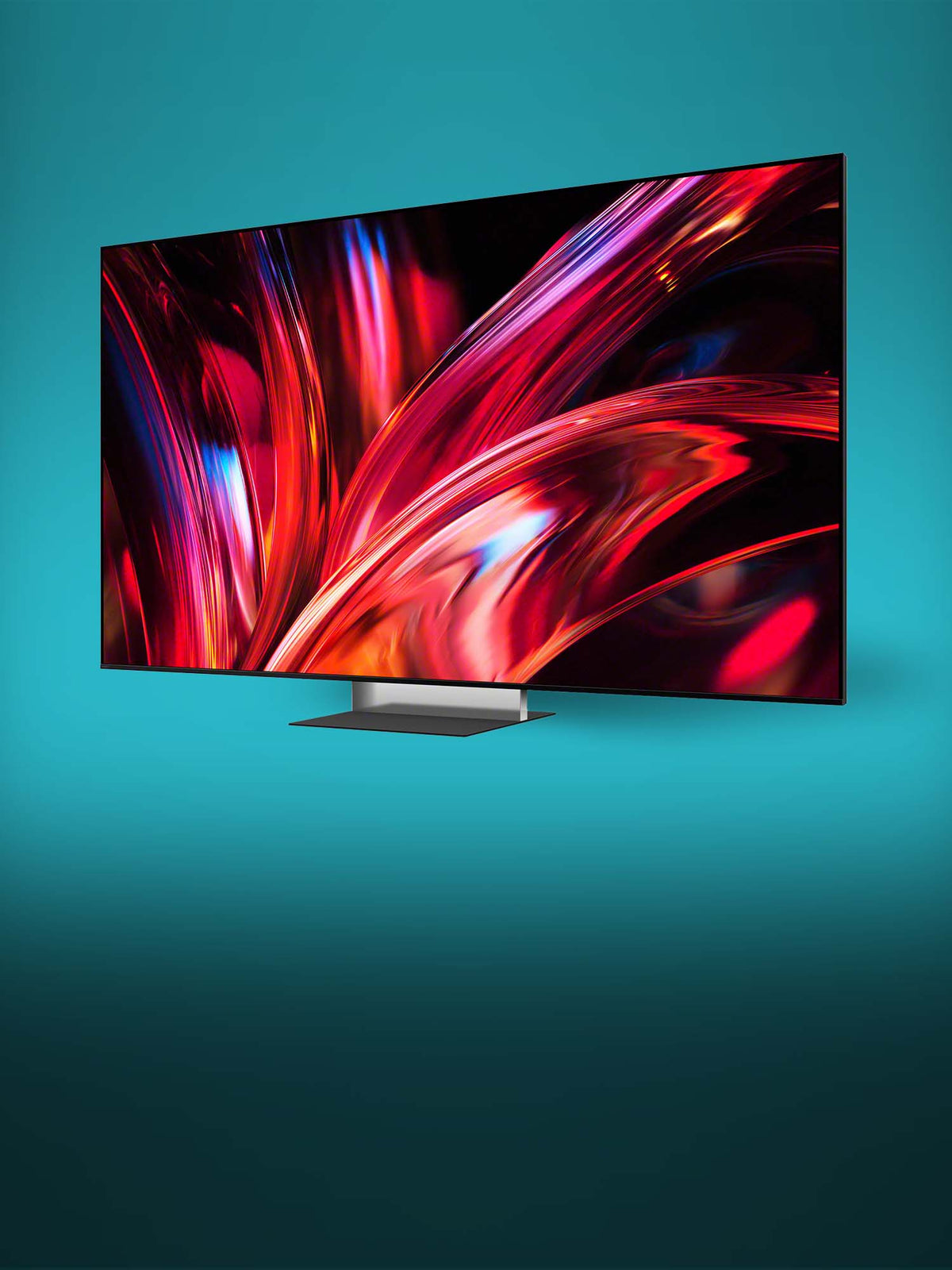 Slim black flat-screen television with a silver rectangular stand displaying a vibrant abstract red 