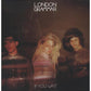 Vinyl LP cover featuring a blurred photo of three band members with the album title at the bottom