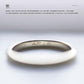 Silver ring with engraved text on the inner band