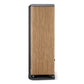 Tall floorstanding speaker with a prime walnut wood veneer cabinet and black base