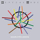 Gray album cover with multicolored sticks radiating from a black circle