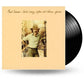 Beige album cover featuring a man in a hat and light shirt leaning on a fire escape