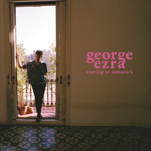 Album cover showing a man standing in an open doorway with pink text on the wall