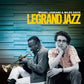 Vinyl LP cover featuring a black and white photo of two men against a blue wooden wall