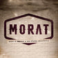 Vinyl LP cover featuring a brick wall background with a maroon logo and album title
