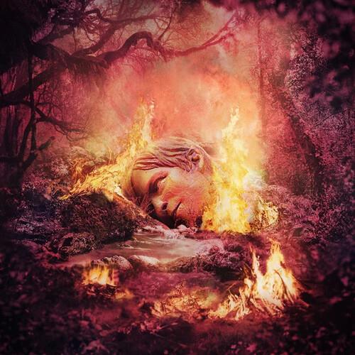 Surreal album cover art featuring a face emerging from flames in a dark forest