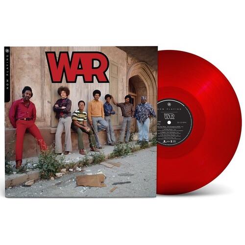 Red translucent vinyl record displayed next to album cover featuring group photo