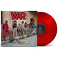 Red translucent vinyl record displayed next to album cover featuring group photo