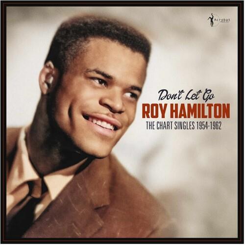 Vinyl LP cover featuring a portrait of a smiling man in a brown suit and tie