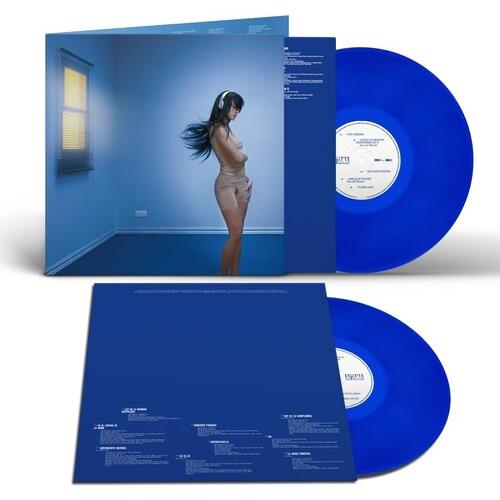 Blue vinyl record with album cover art featuring a woman in a blue room