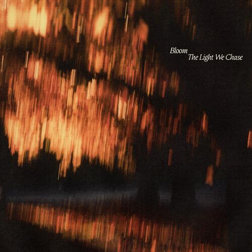 Vinyl LP cover featuring abstract blurred orange and yellow light streaks against a dark background