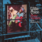 Vinyl LP cover featuring two men in Santa and elf costumes looking through a window