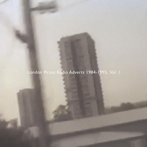 Vinyl LP cover featuring a grainy black and white photograph of a tall apartment building