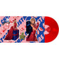 Red vinyl record with a pink and blue holiday-themed sleeve featuring a woman in a red gown