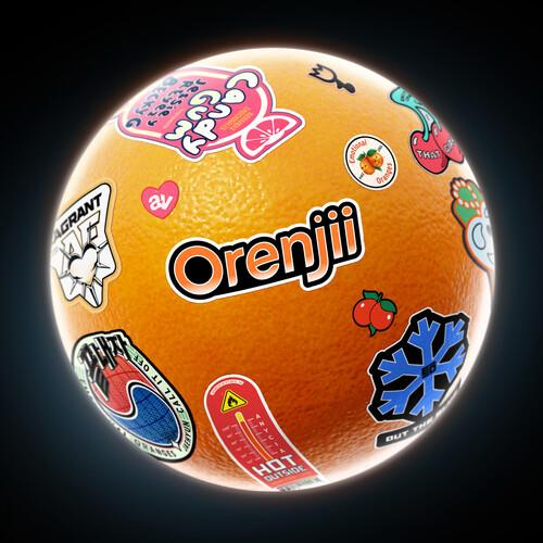 Orange vinyl record with colorful stickers including cherries and a snowflake