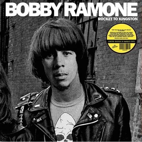 Black and white album cover featuring a man in a studded leather jacket and graphic t-shirt