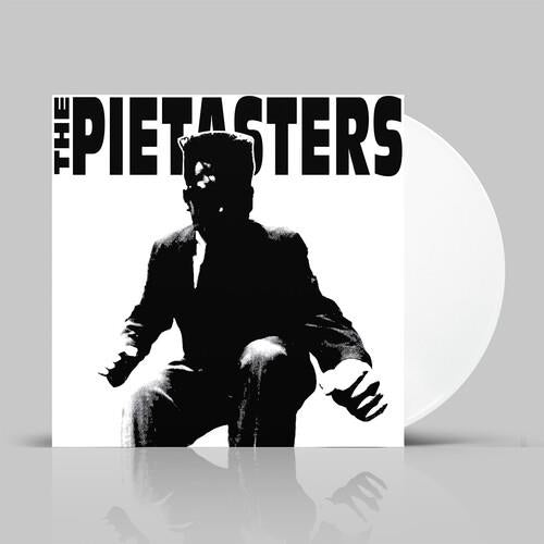 White vinyl record with black and white album cover featuring a silhouetted figure