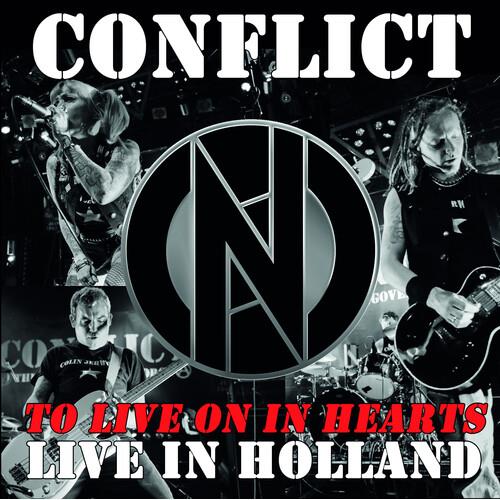 Black and white album cover featuring a band performing live with a large circular logo in the cente