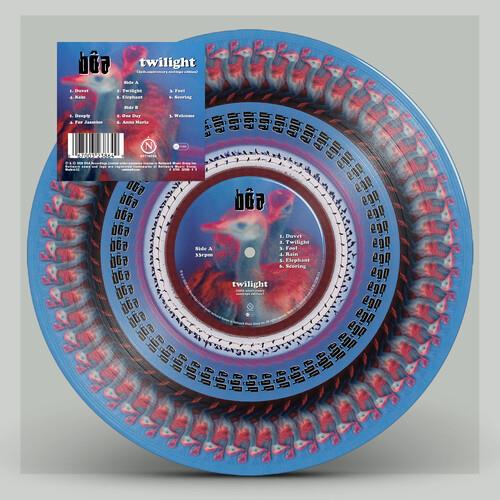 Blue vinyl record with a zoetrope animation design featuring a wolf and red and black text