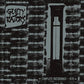 Black and white album cover with a brick wall, a tall window, and a graffiti-style logo