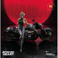Silver and gold robot woman leaning against a black motorcycle with a red circular background