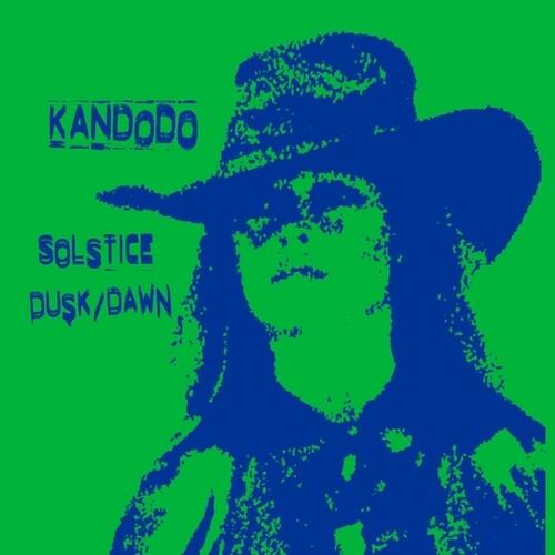 Green and blue vinyl album cover featuring a high-contrast portrait of a person wearing a wide-brimm