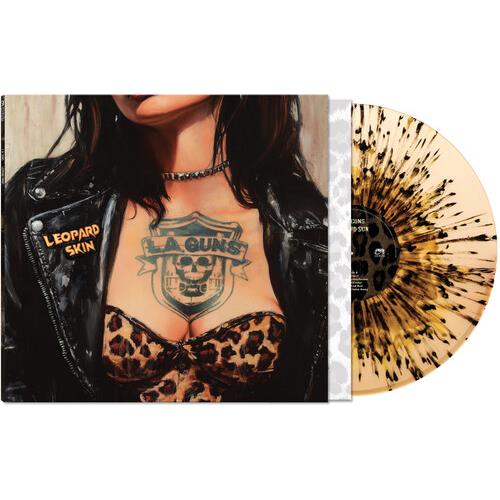 Leopard print vinyl record with black splatter pattern next to album cover featuring a woman in a le