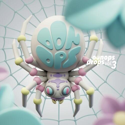Stylized pastel spider figurine with a round body and colorful lettering