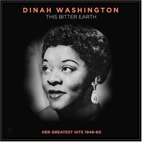 Black and white portrait of a woman with short curly hair and dangling earrings on a vinyl record co