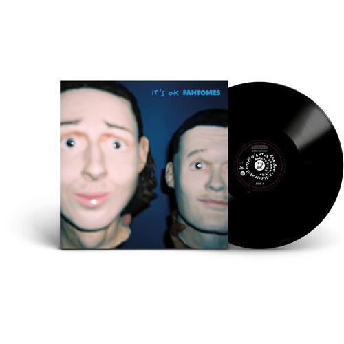 Black vinyl record partially removed from blue album sleeve featuring two illustrated faces