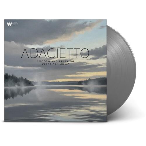 Vinyl LP with a landscape cover showing a misty lake at dawn and a silver record partially visible
