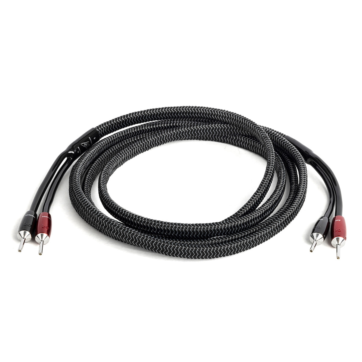 Black braided speaker cable with silver banana plugs and red and black connectors